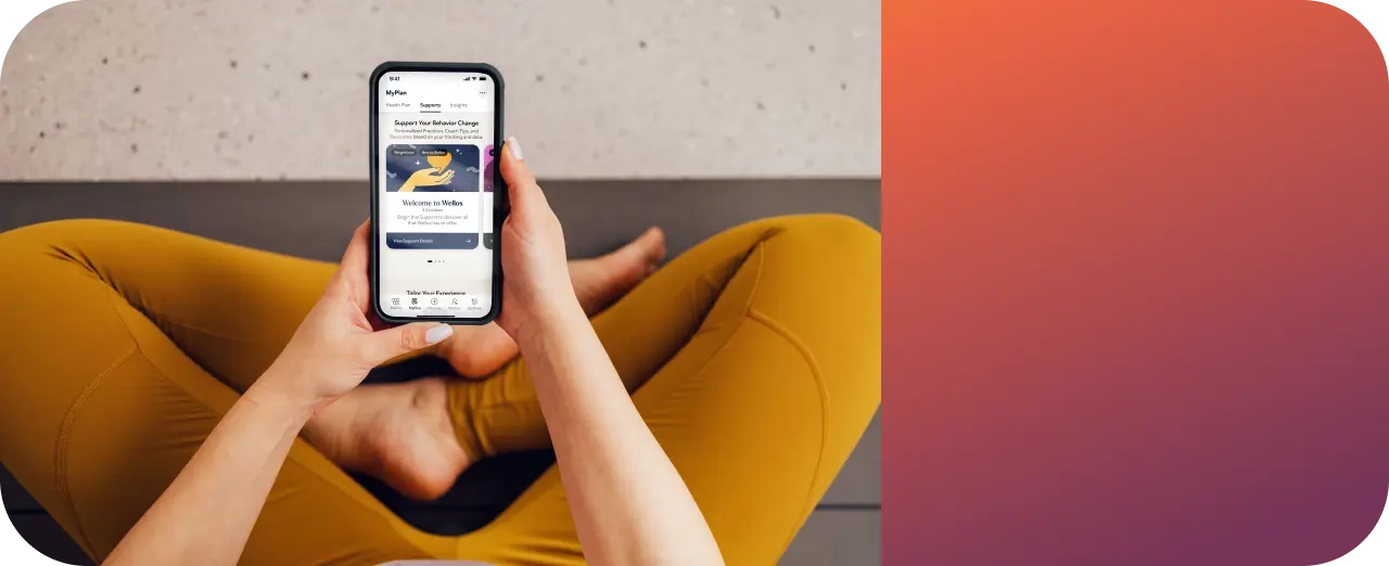 Person sitting on couch with phone